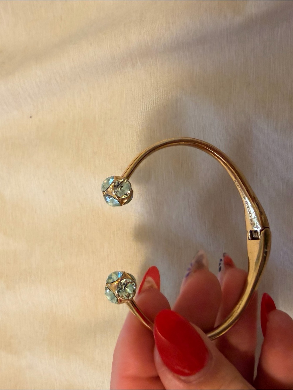 Michael Kors Gold Open Bangle with Light Blue Crystal Ends